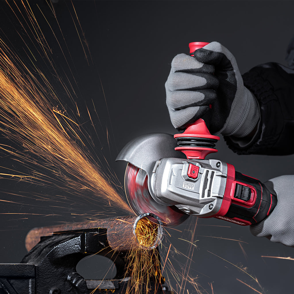Worcraft angle grinder with handle cordless used to cut iron pipe