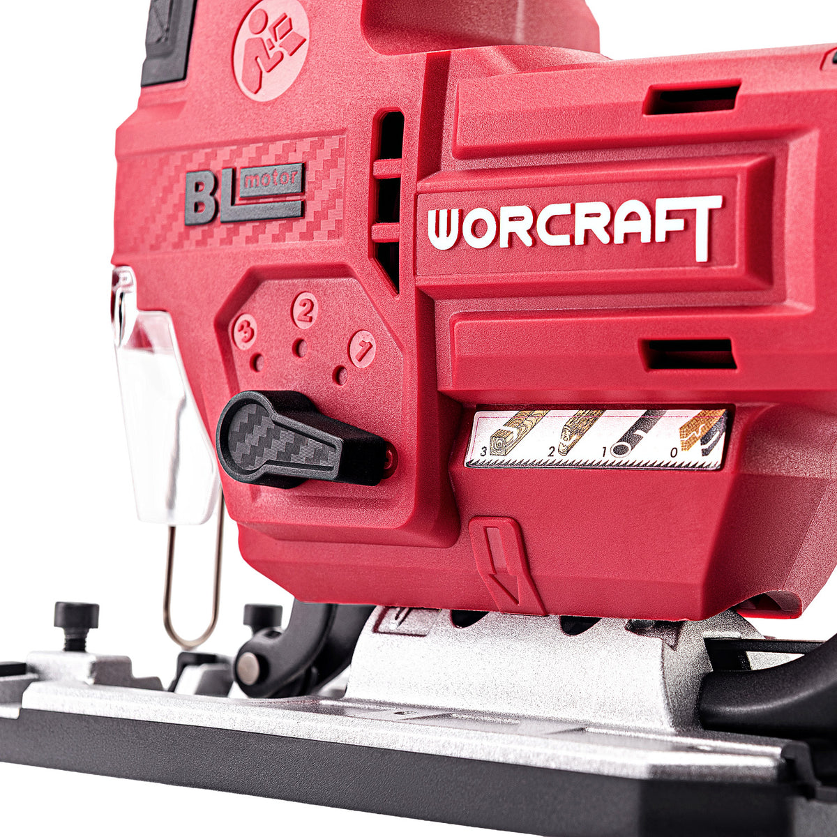Close-up of a red Worcraft jigsaw with a silver base plate and black adjustment knobs, showing the brand name and blade settings on a white background.