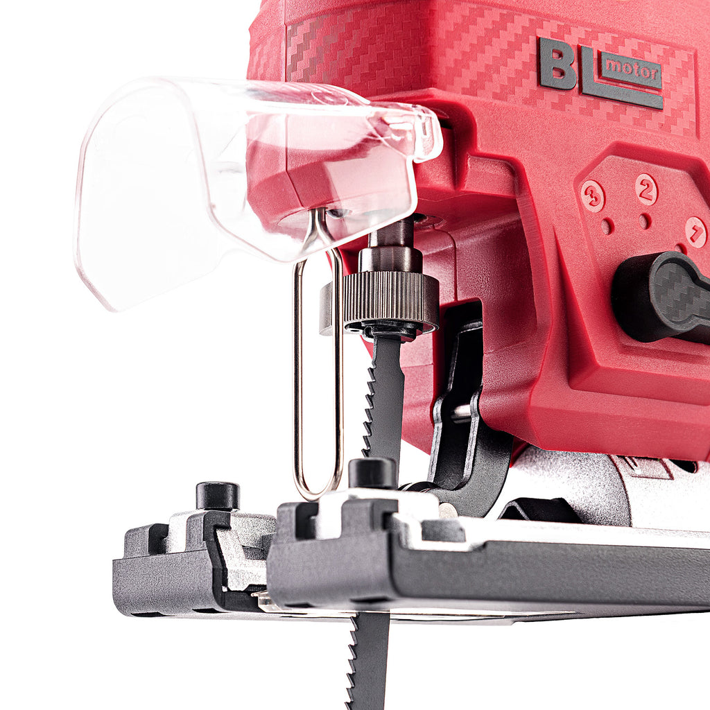 Close-up of a Worcraft red and black cordless jigsaw with a clear dust guard and metal guide rail, shown on a white background.