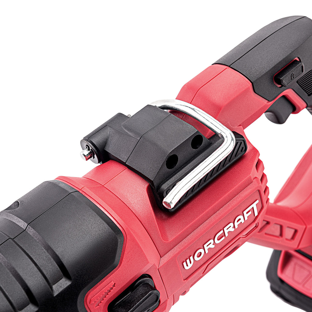 Close-up of a red and black WorCraft cordless tool showing a mounting bracket and part of the handle on a white background.