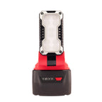 A cordless LED lantern with a red and black handle and a white light panel, shown on a solid white background.