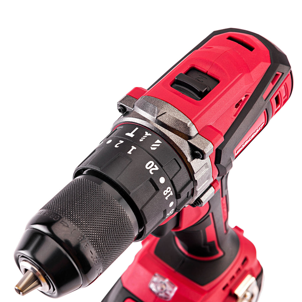 A cordless power drill with a red and black body, silver metal chuck, and black dial turret, photographed on a clean white background.