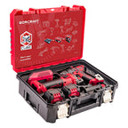 A red and black WORCRAFT XCUBE cordless drill kit displayed in an open molded storage case on a white background. The kit includes a drill, two cordless batteries, and various accessories organized in the case.