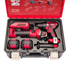 A cordless power tool kit by Worcraft XCUBE in a hard carrying case, featuring a red and black angle grinder, drill driver, two batteries, a hand grip tool, and a red carrying case with assembly diagrams on the inside lid.