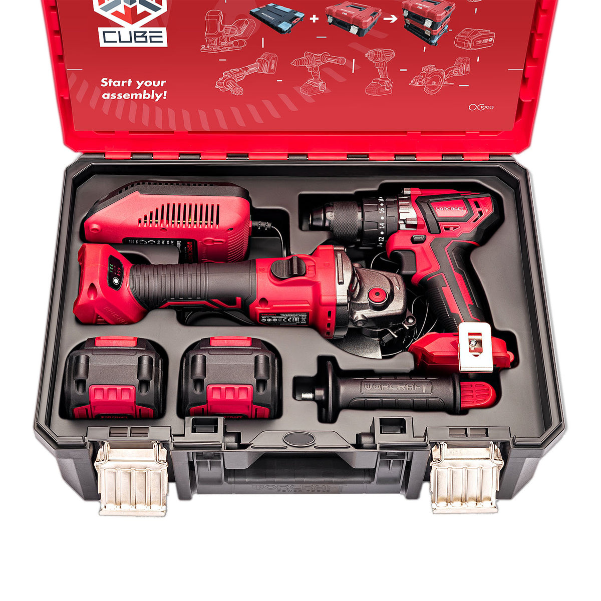 A cordless power tool kit by Worcraft XCUBE in a hard carrying case, featuring a red and black angle grinder, drill driver, two batteries, a hand grip tool, and a red carrying case with assembly diagrams on the inside lid.