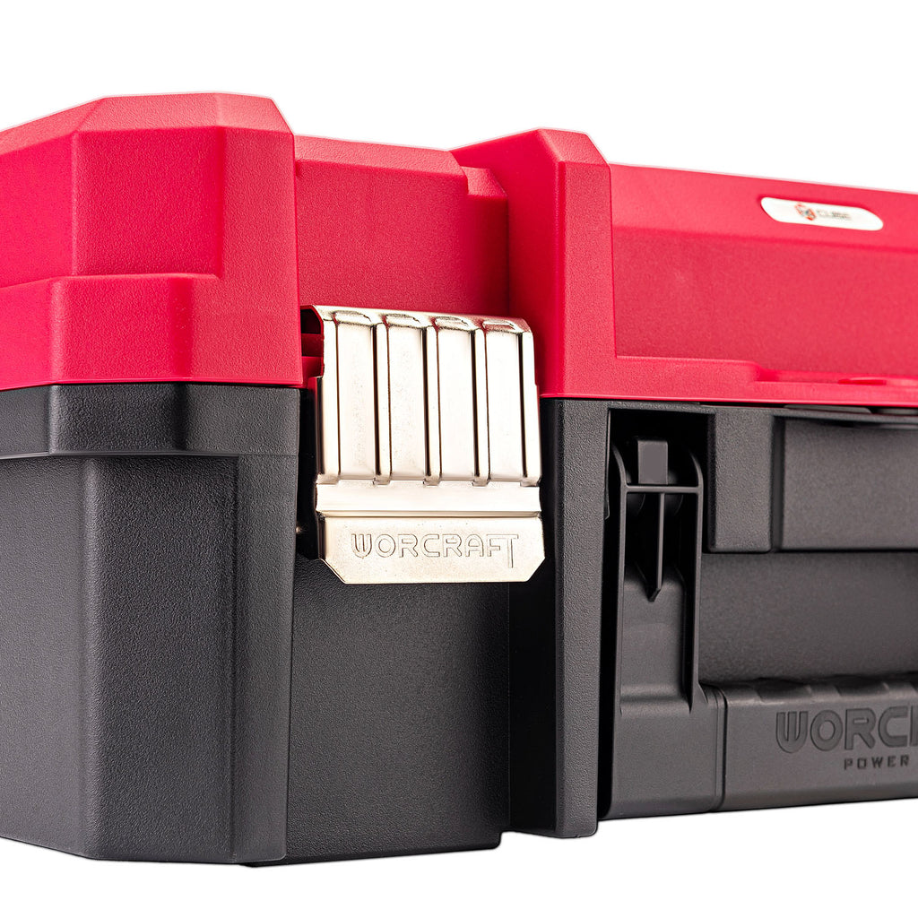 Close-up of a red and black plastic tool box with a silver metal latch, showing the WORCRAFT brand name on the latch and side.